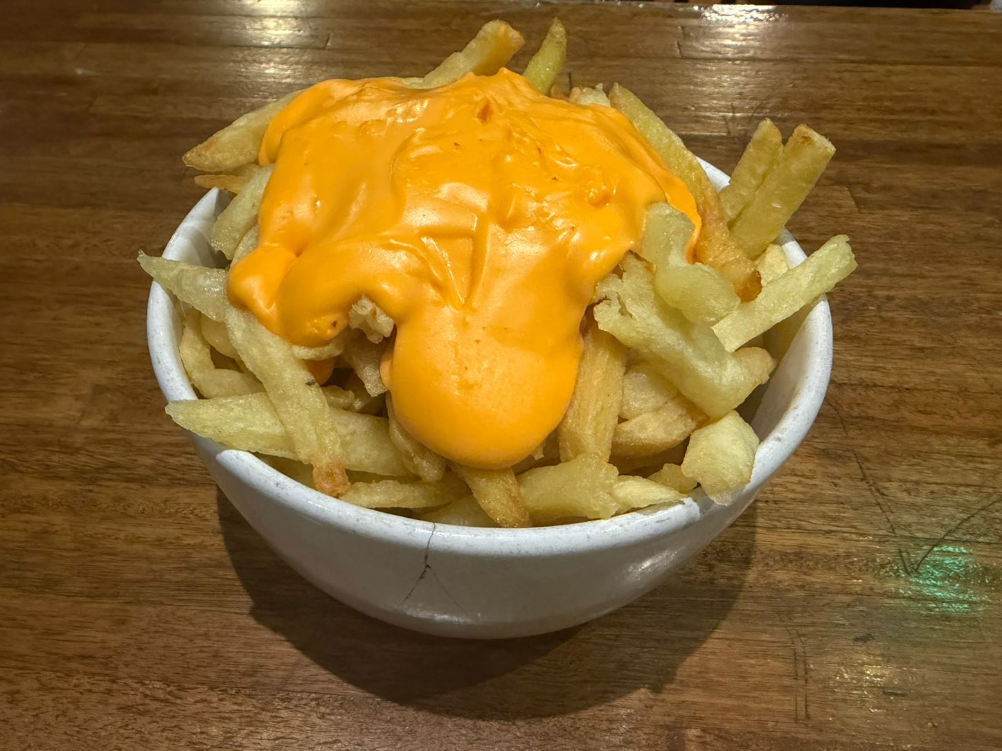PAPAS CON CHEDDAR
