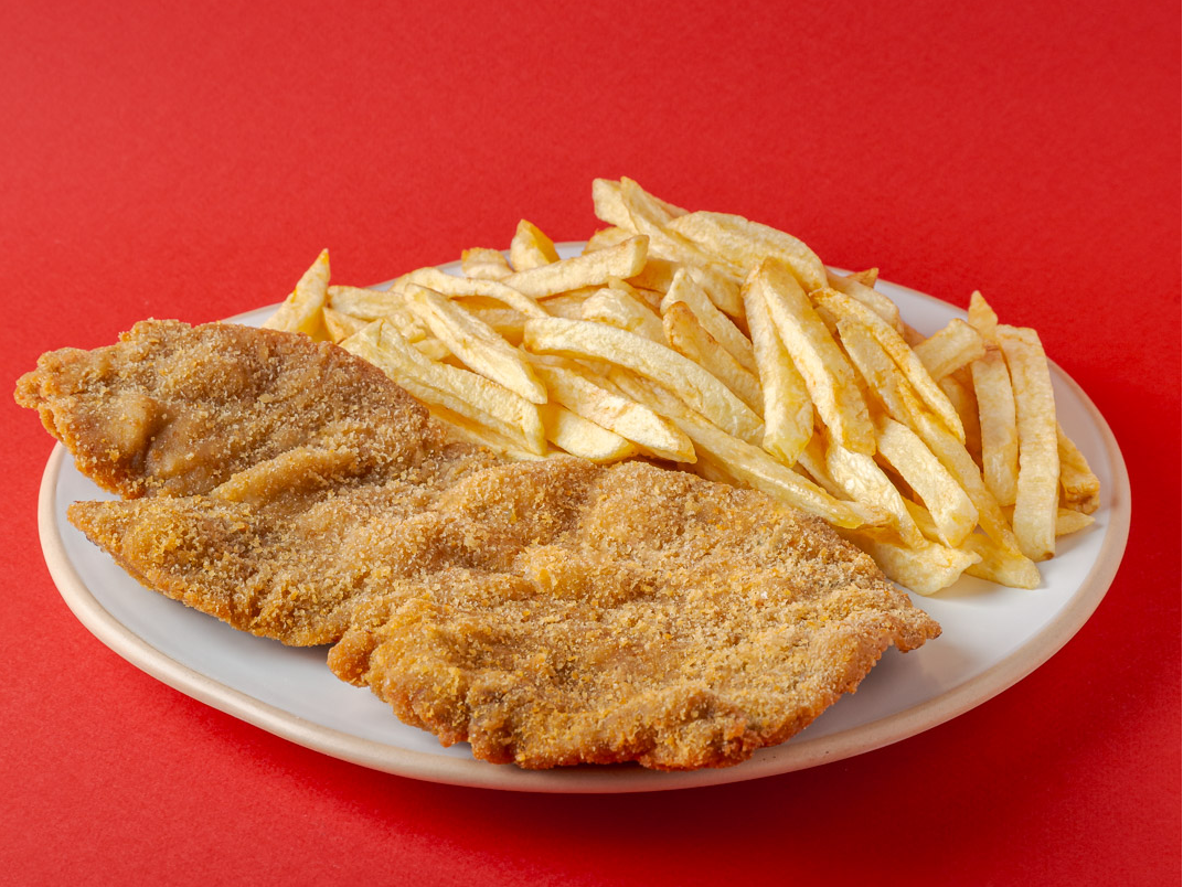 Milanesa con guarnición de TREZERI