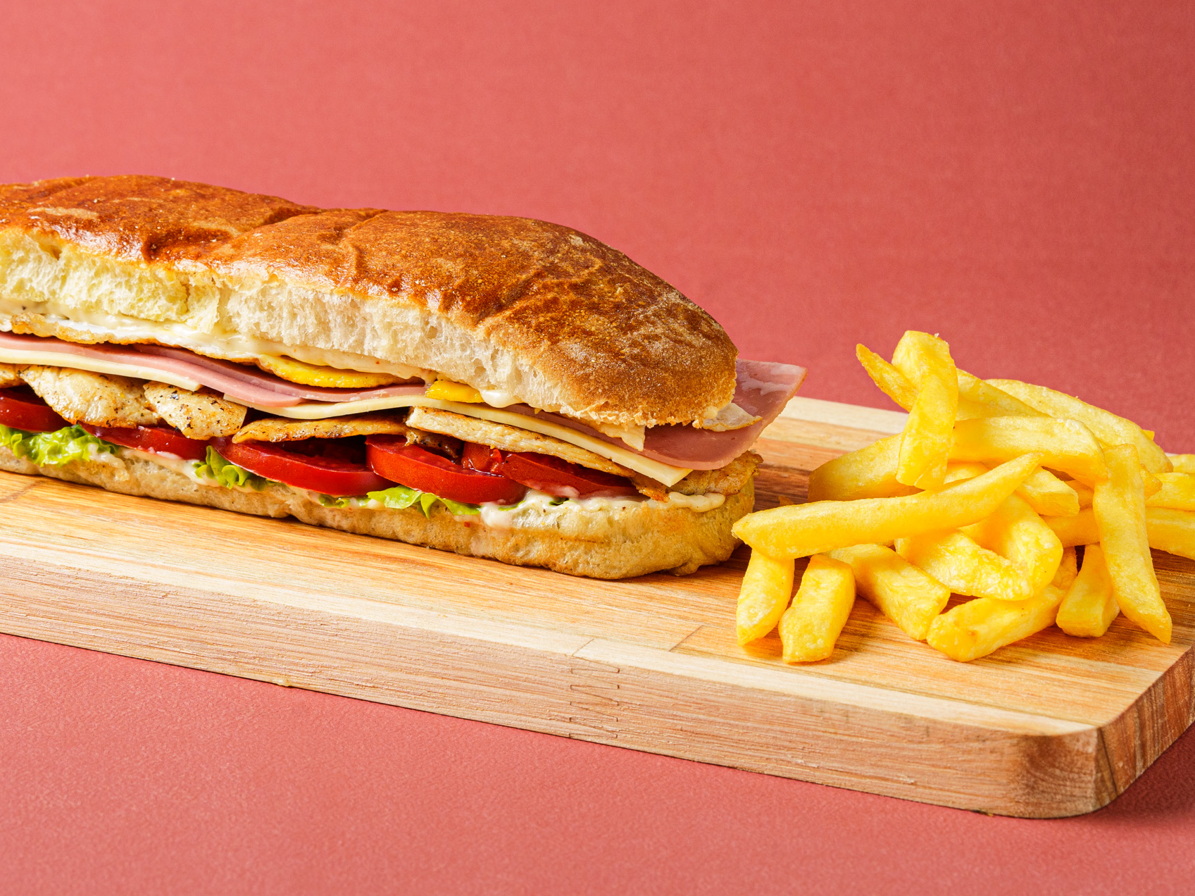 Lomo de Pollo mediano + papas fritas