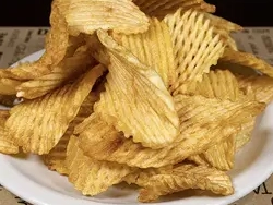 Porción de papas rejillas