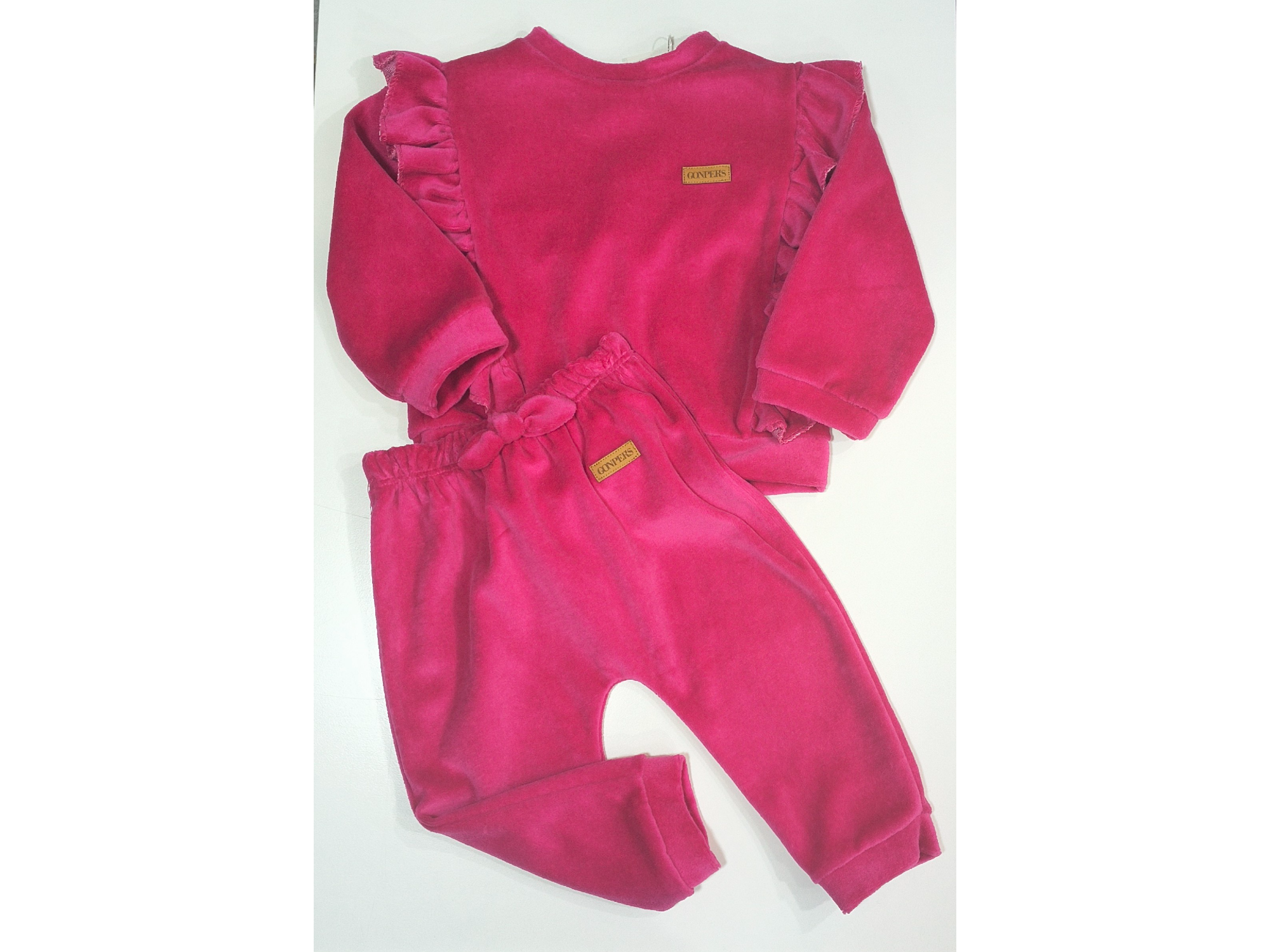 Conjunto de plush fucsia talle 9 meses