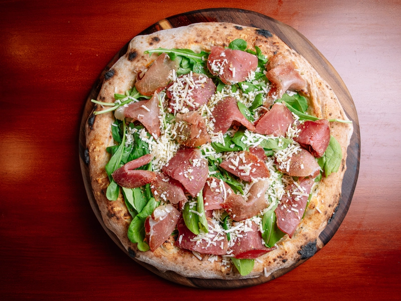 Rúcula c/ prosciutto 8 porc