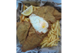 Milanesa a caballo con fritas