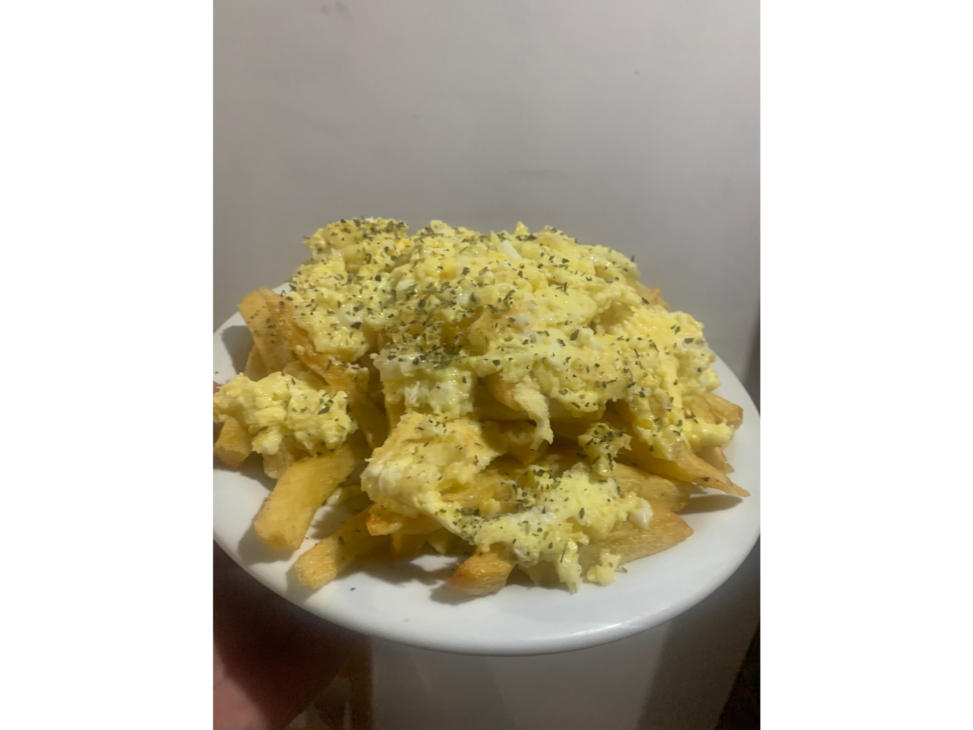 Porción de Fritas con huevo revuelto
