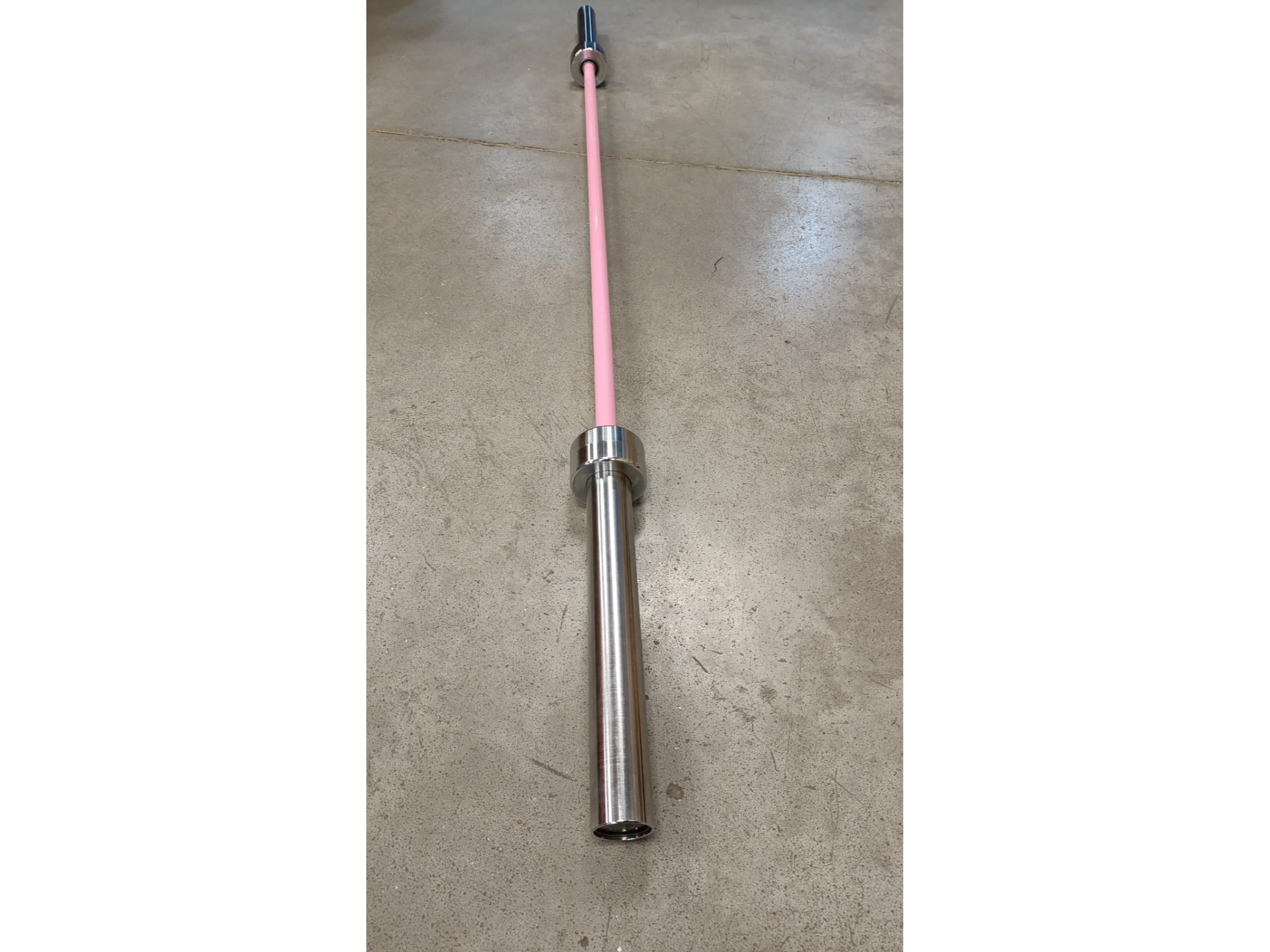 BARRA OLIMPICA 2,00 M. 15 KG GRIP 25 MM ROSA