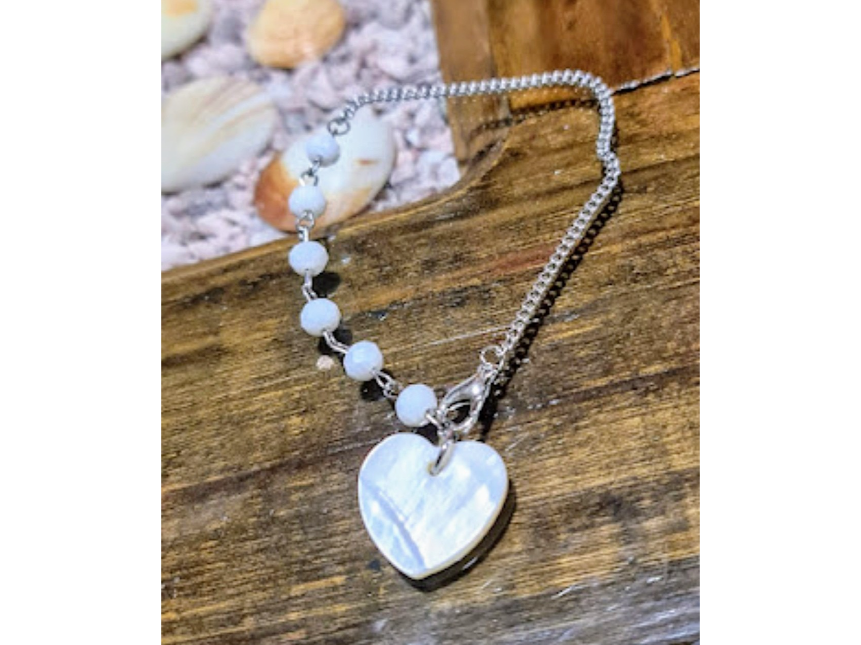 Pulsera acero con corazon de nácar