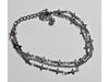 Pulsera triple con cruces