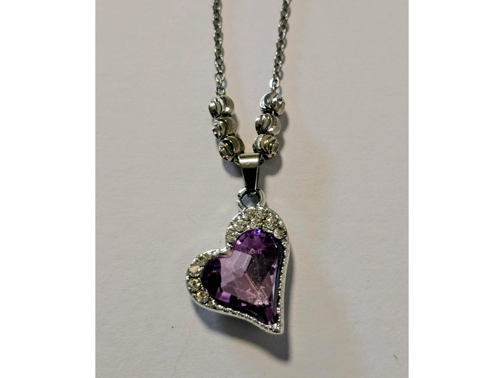 Conjunto corazón lila
