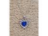 Corazón azul con cadena