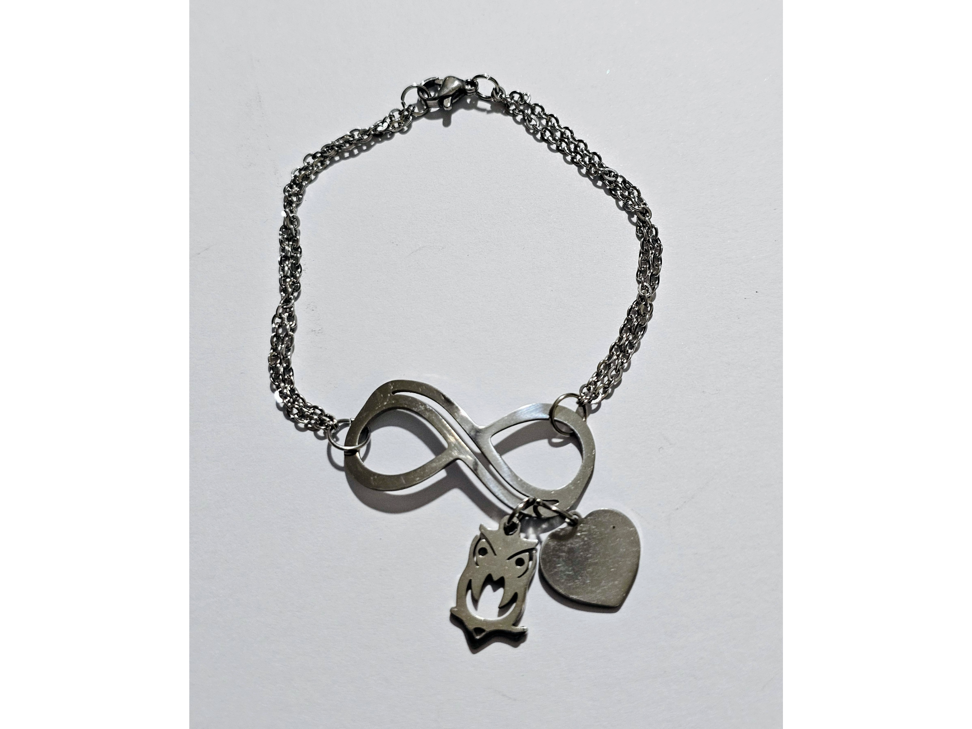 Pulsera infinito y búho