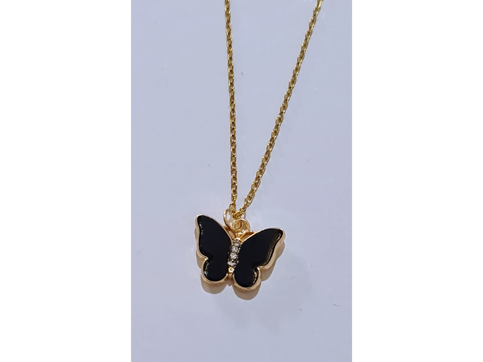 Dije acero  dorado mariposa negra