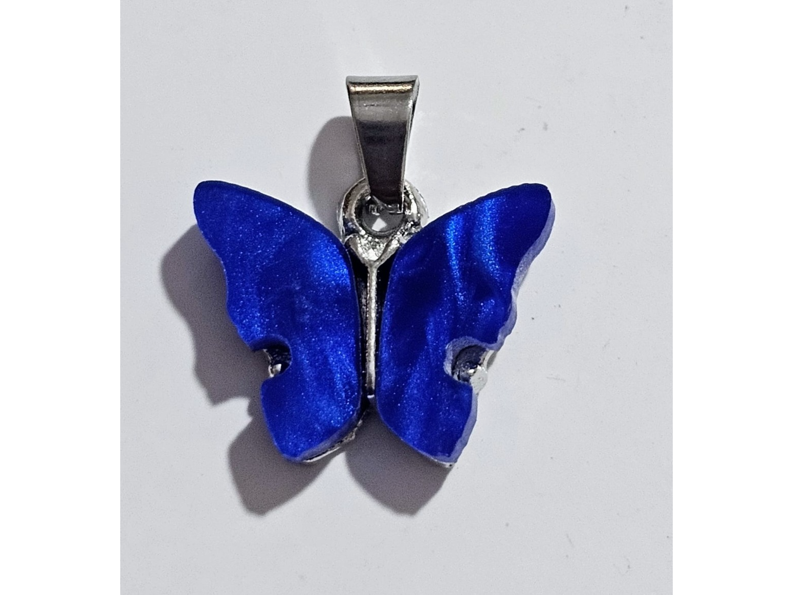 Dije mariposa azul