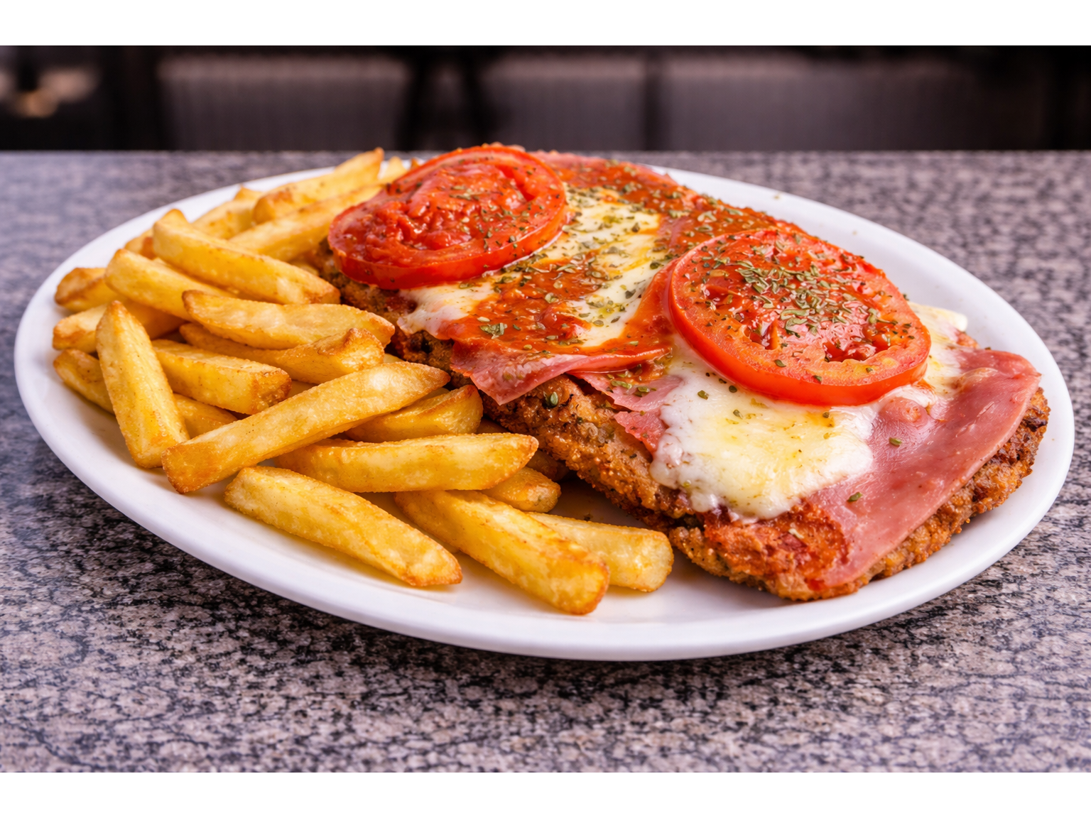 Suprema de Pollo Napolitana con Guarnicion a Eleccion