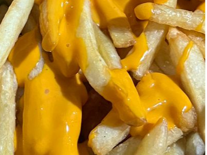 Papas con cheddar
