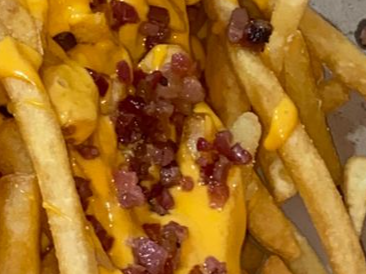 Papas c/ cheddar y panceta