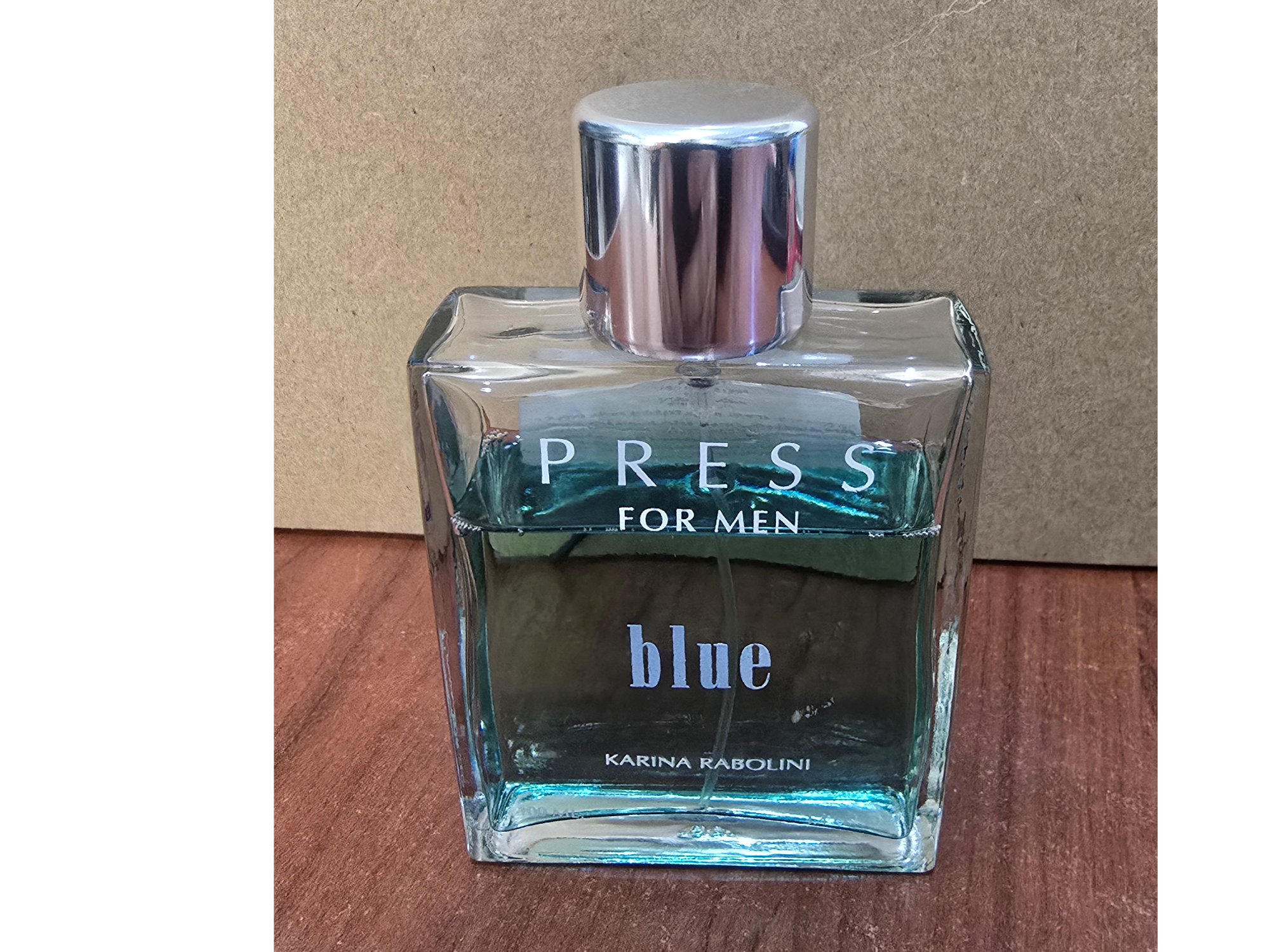 Press Blue For men usado, contenido a la vista (frasco de 100 ml)