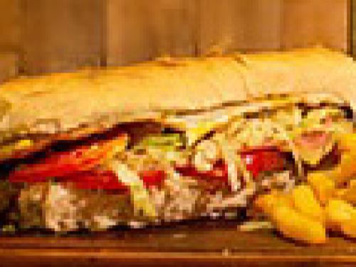 SANDWICH DE MILA COMPLETO CON PAPAS de Pizza R Carlos Paz