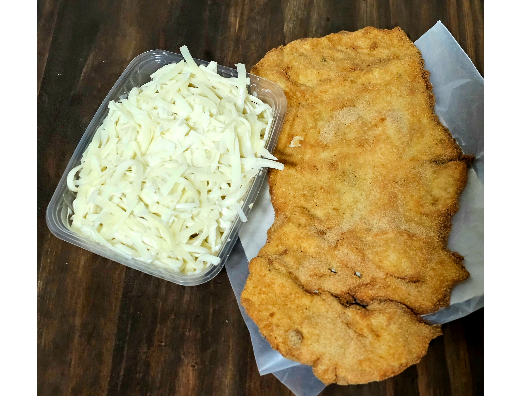 Milanesa con Fideos con Manteca