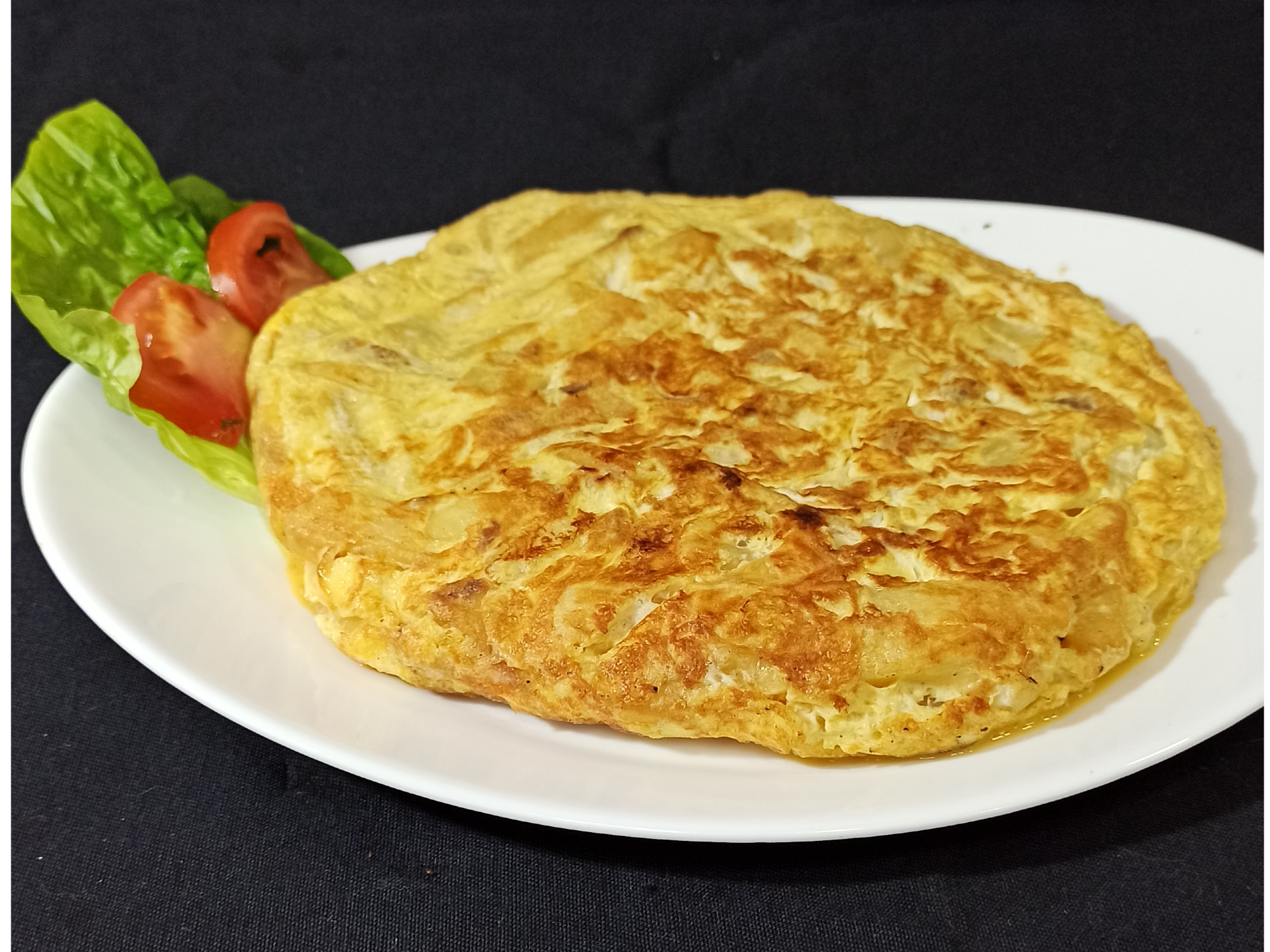 Tortilla de Papa y Cebolla de Una! Parrilla