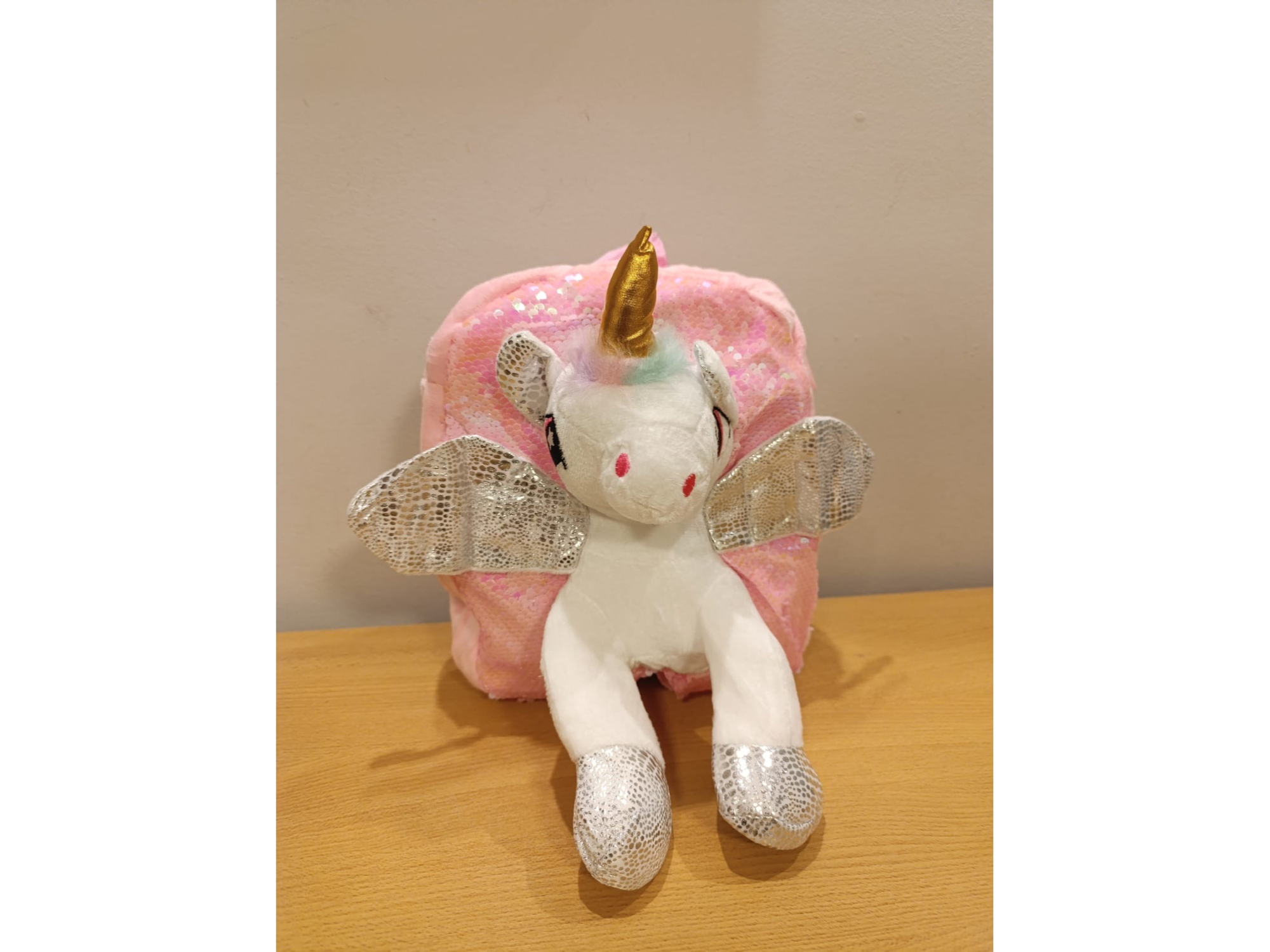 Mochila unicornio mágico de peluche