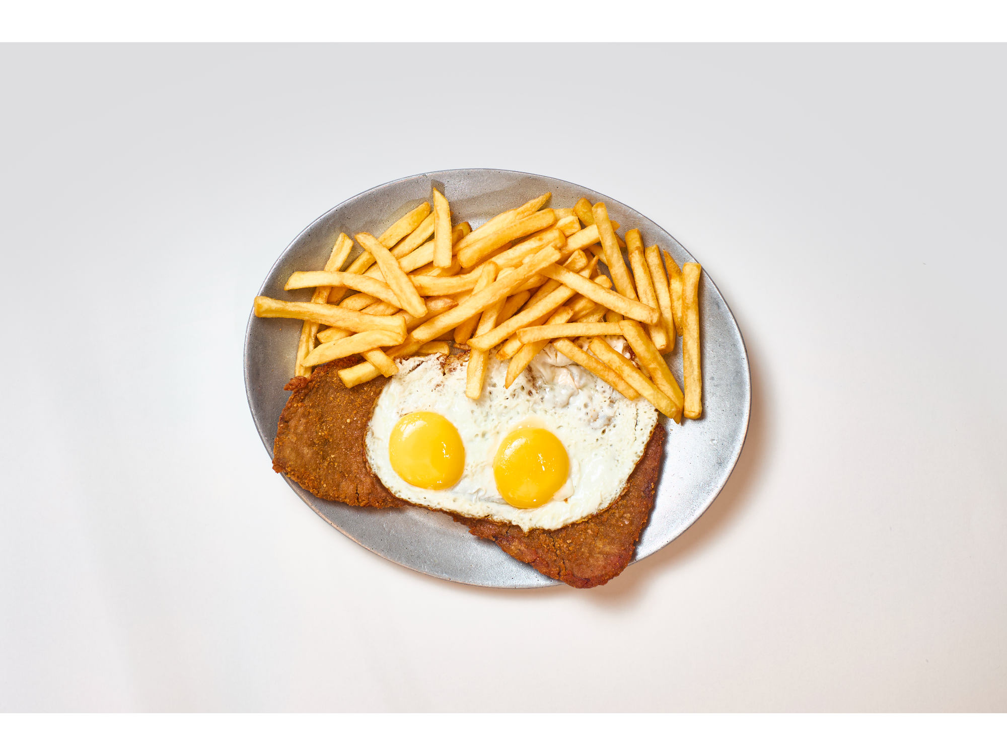 Milanesa a caballo de Mostachys Chacabuco