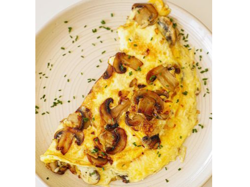 Omelette de queso y champiñones