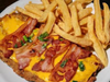 Milanesa americana con guarnición