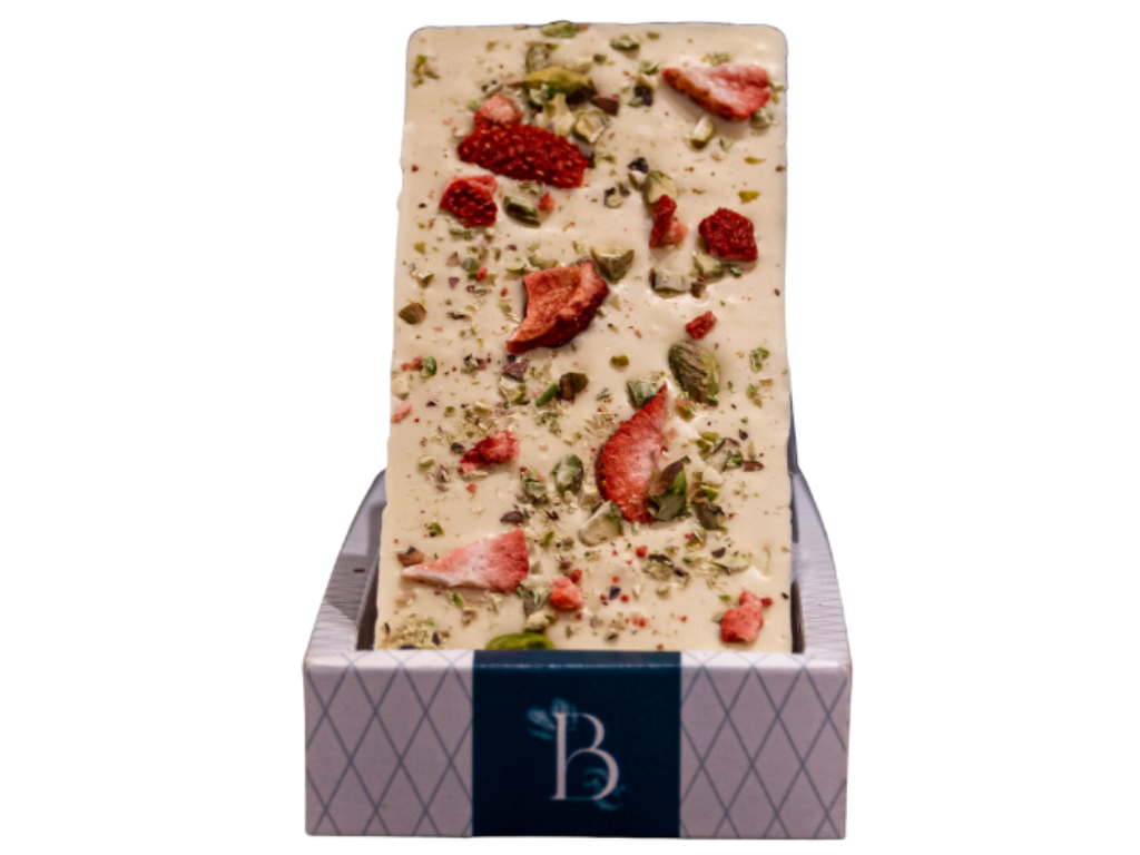 Tableta de chocolate blanco con frutillas liofilizadas de BaselChocolateria