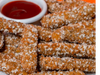 Palitos de pollo Crocantes a las finas hierbas.