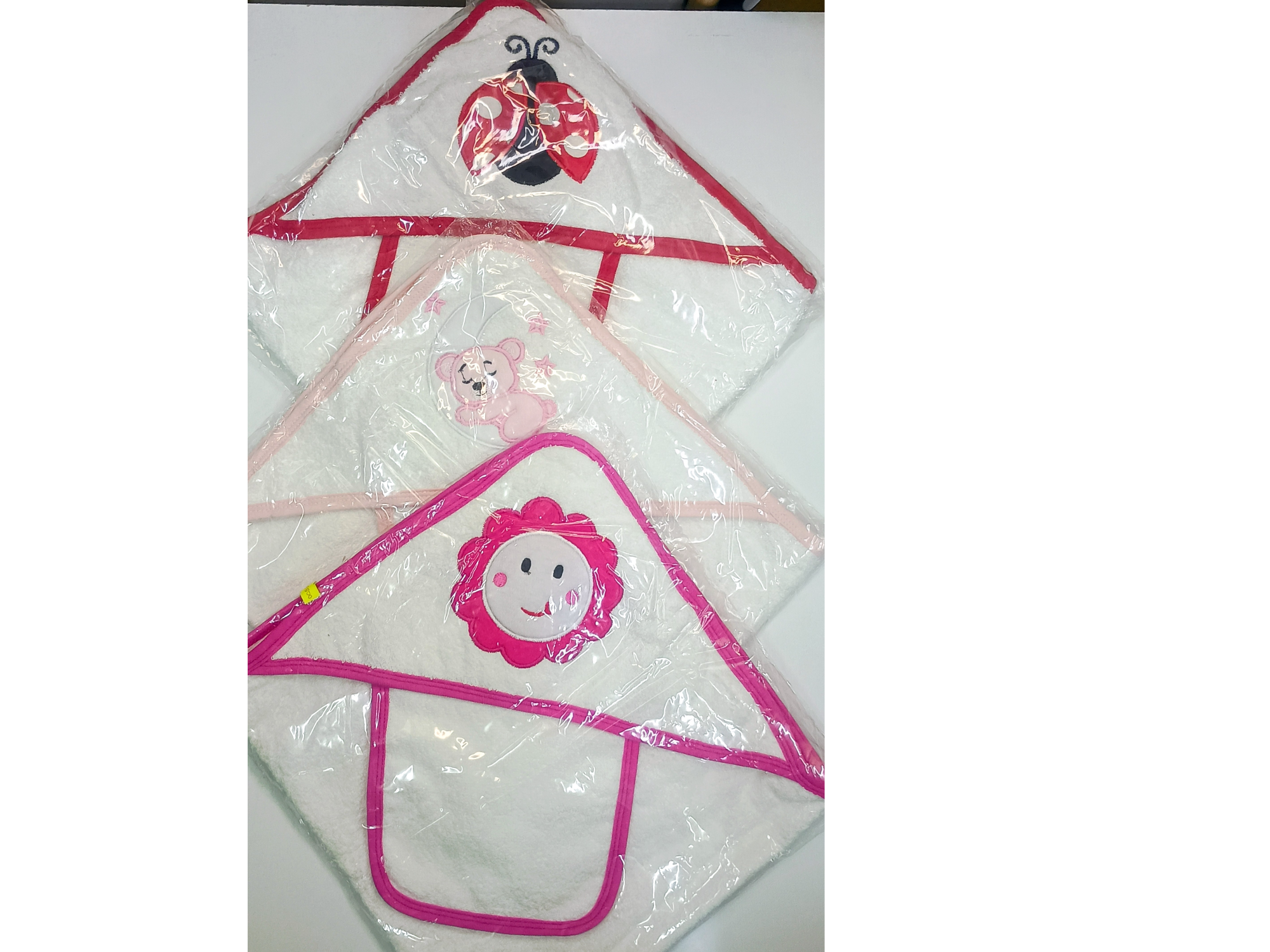 Toalla con capucha y babita