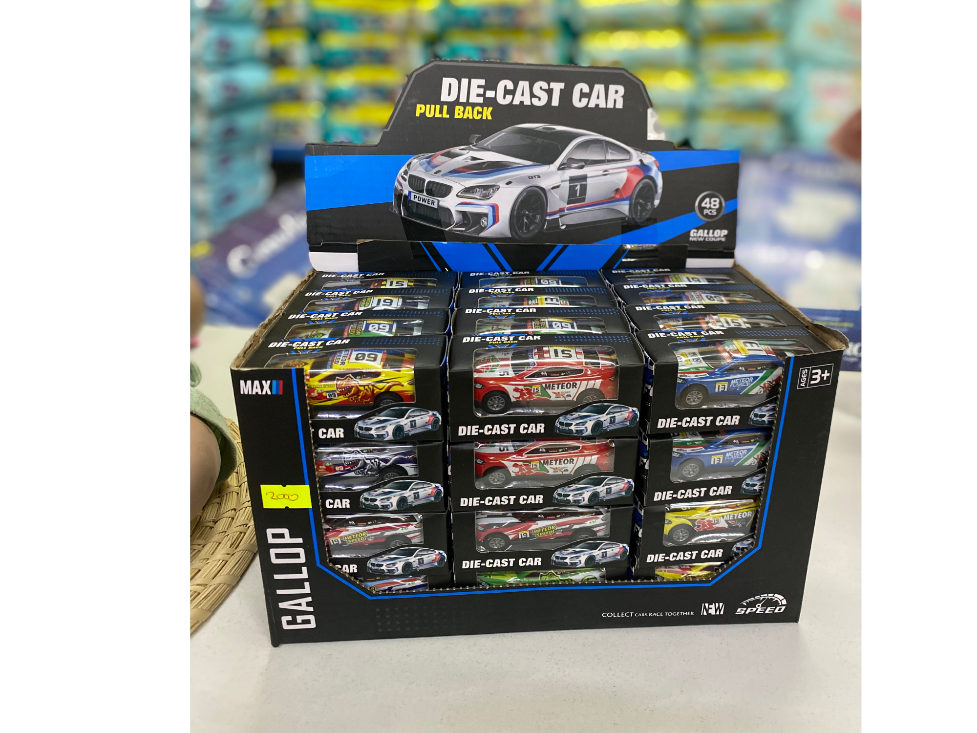 Auto a fricción en caja