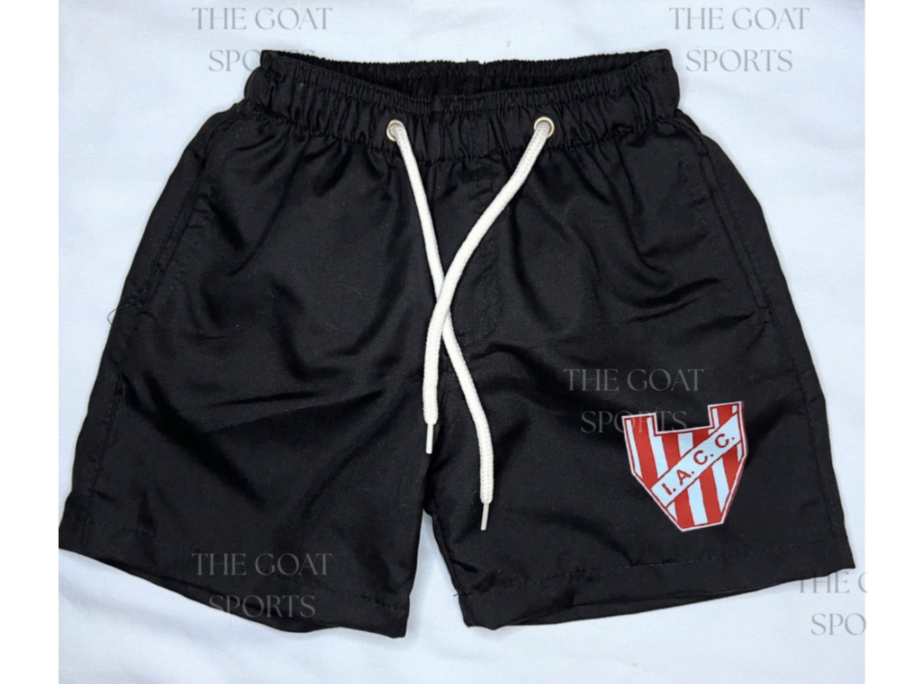 Shor de baño - escudo iacc