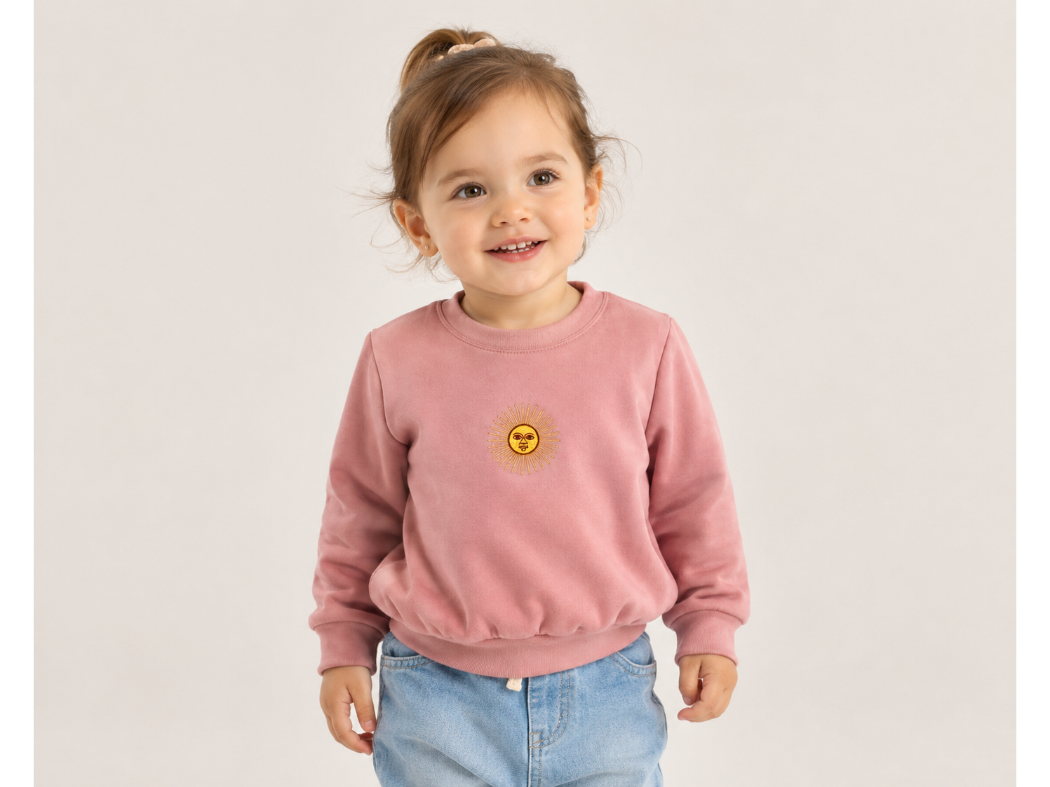 Buzo Sol de Mayo bebe plush celeste o rosa