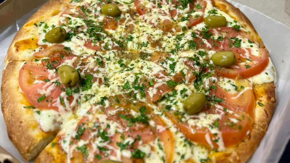PIZZAS