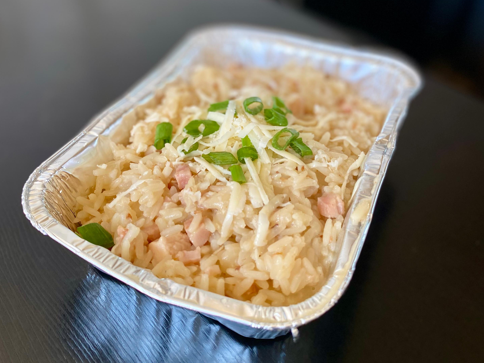 Risotto de arroz, pollo y panceta