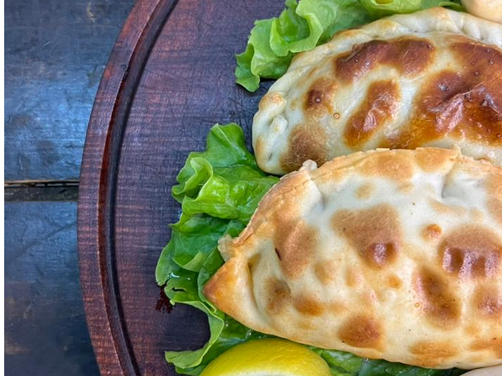 Empanada unidad cebolla y queso