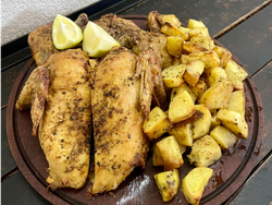 Pollo entero con papas al horno