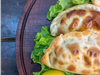 4 empanadas + lata schneider