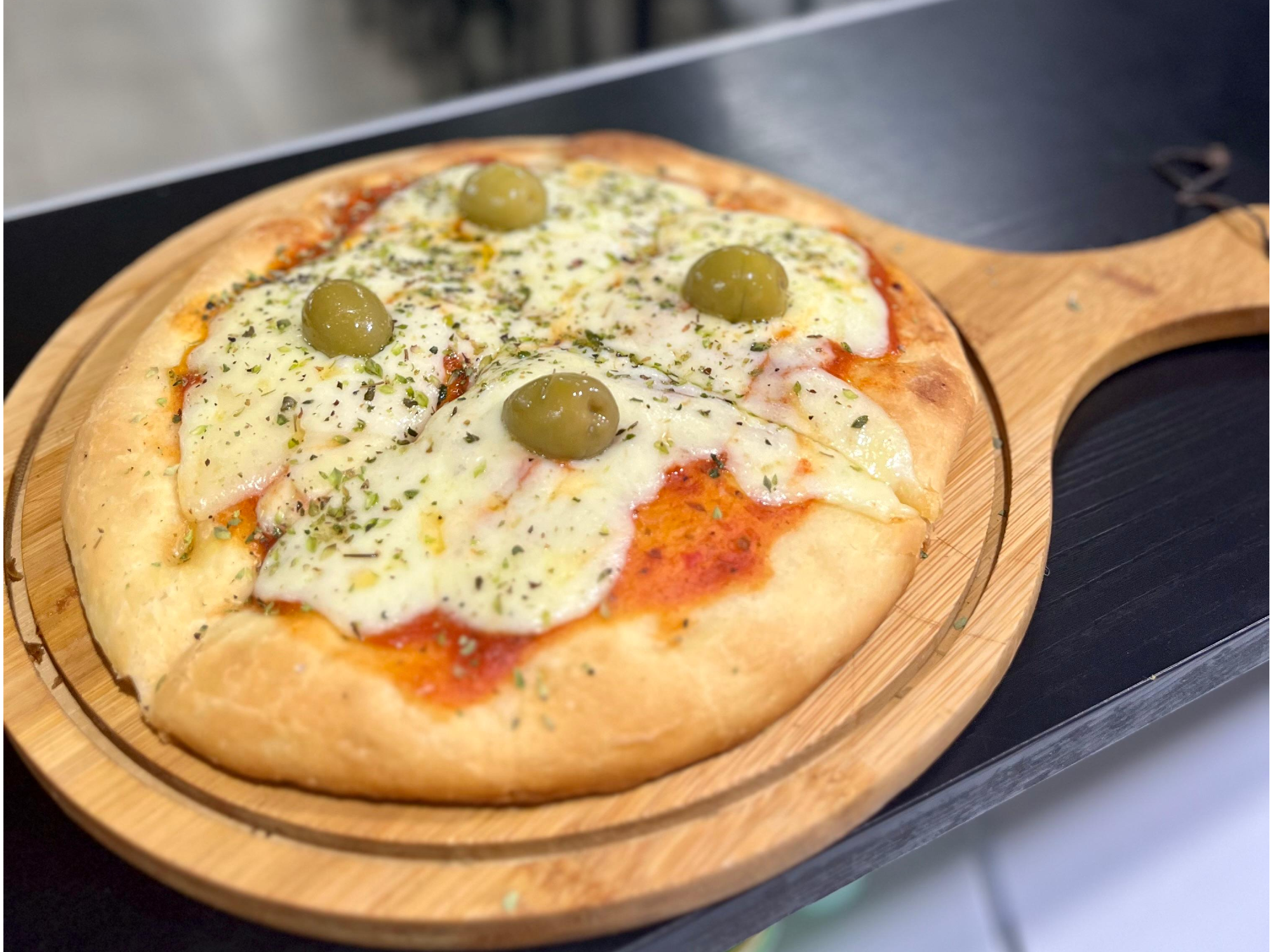 Pizza muzzarella de 4 porciones