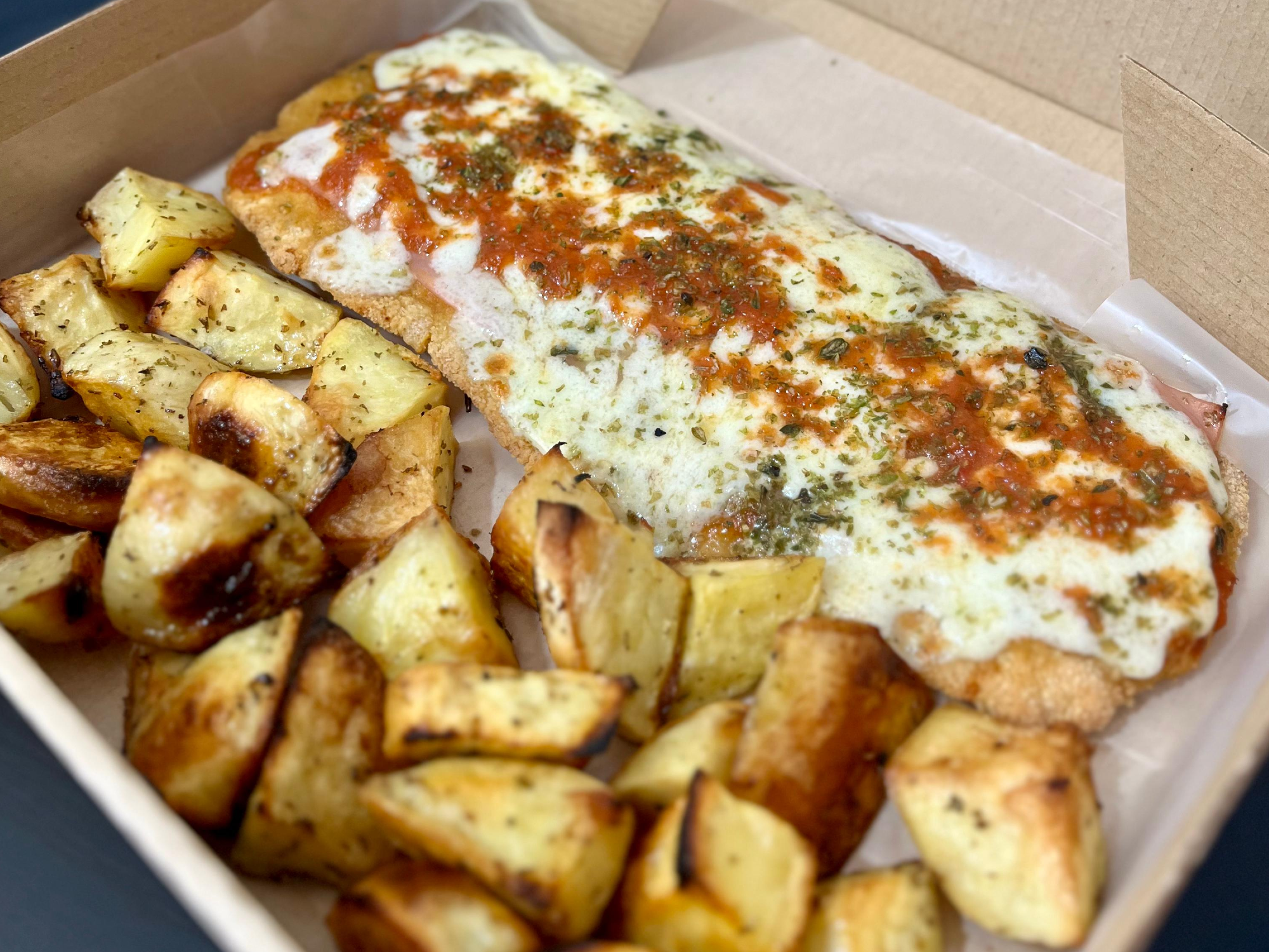 Milanesa napolitana con guarnicion