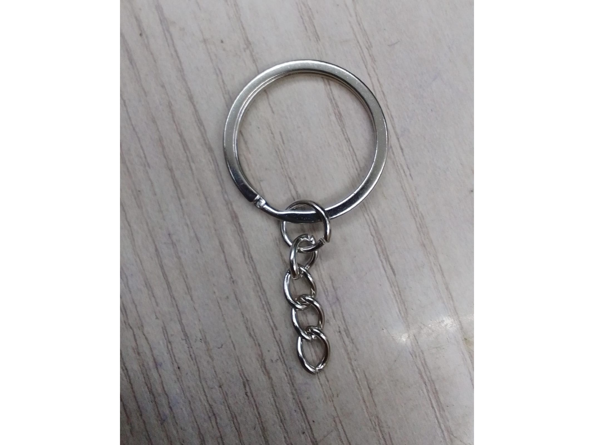 Argolla para llaveros plana 2.2cm  niquel x 100u