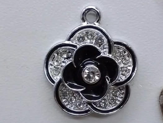 Dijes brillos flor premium x unidad