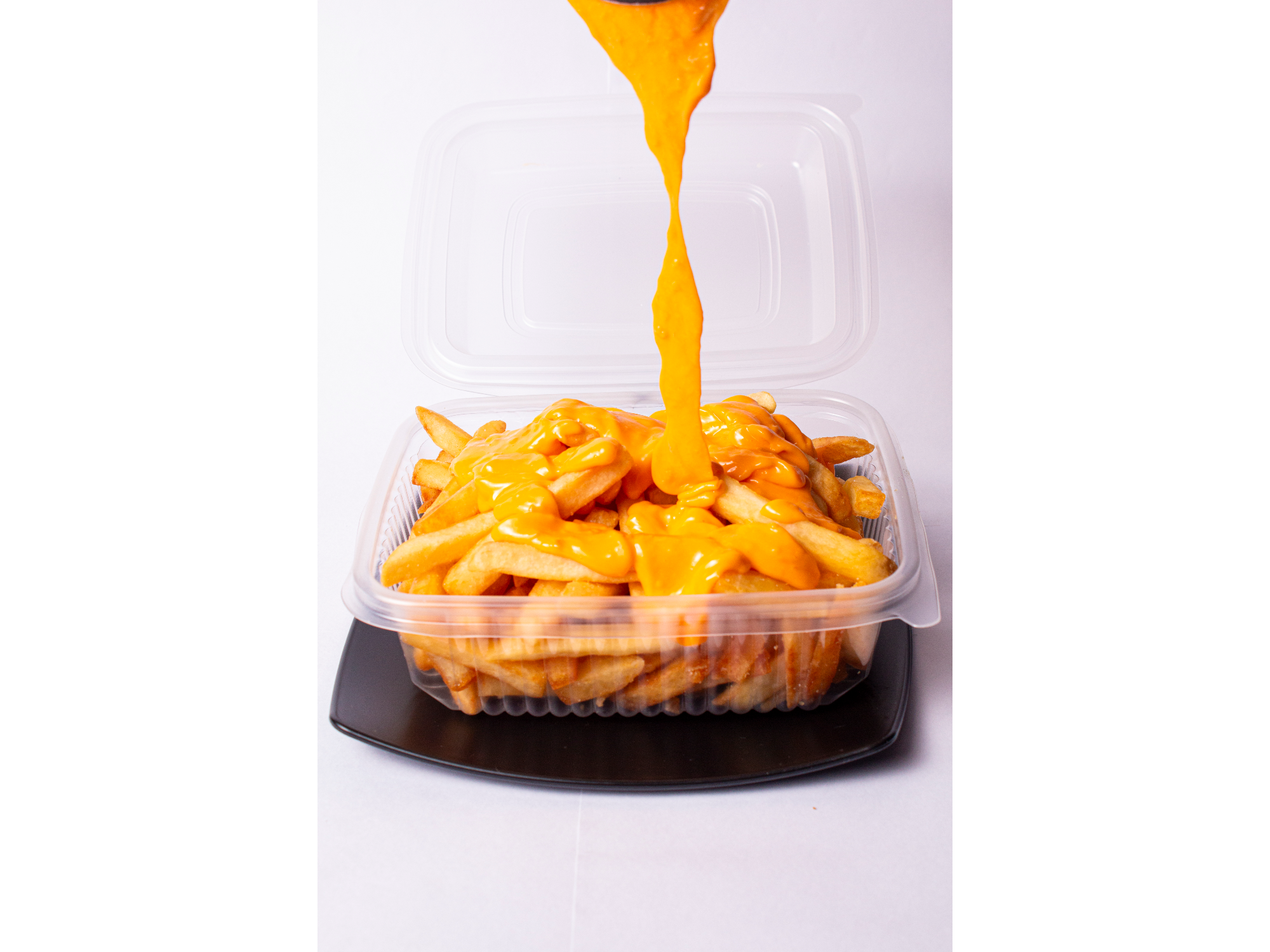Porción de papas con cheddar