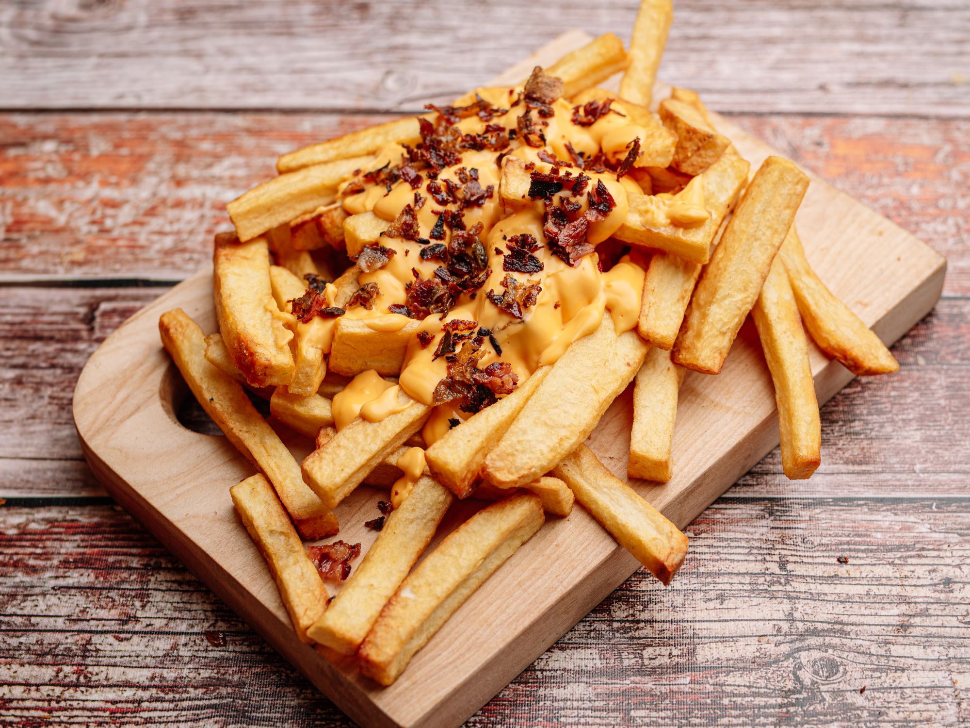 Papas con Cheddar y Bacon