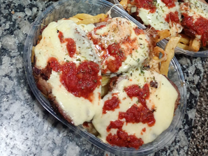 Milanesa napolitana con papas fritas de Los Tres Hermanos