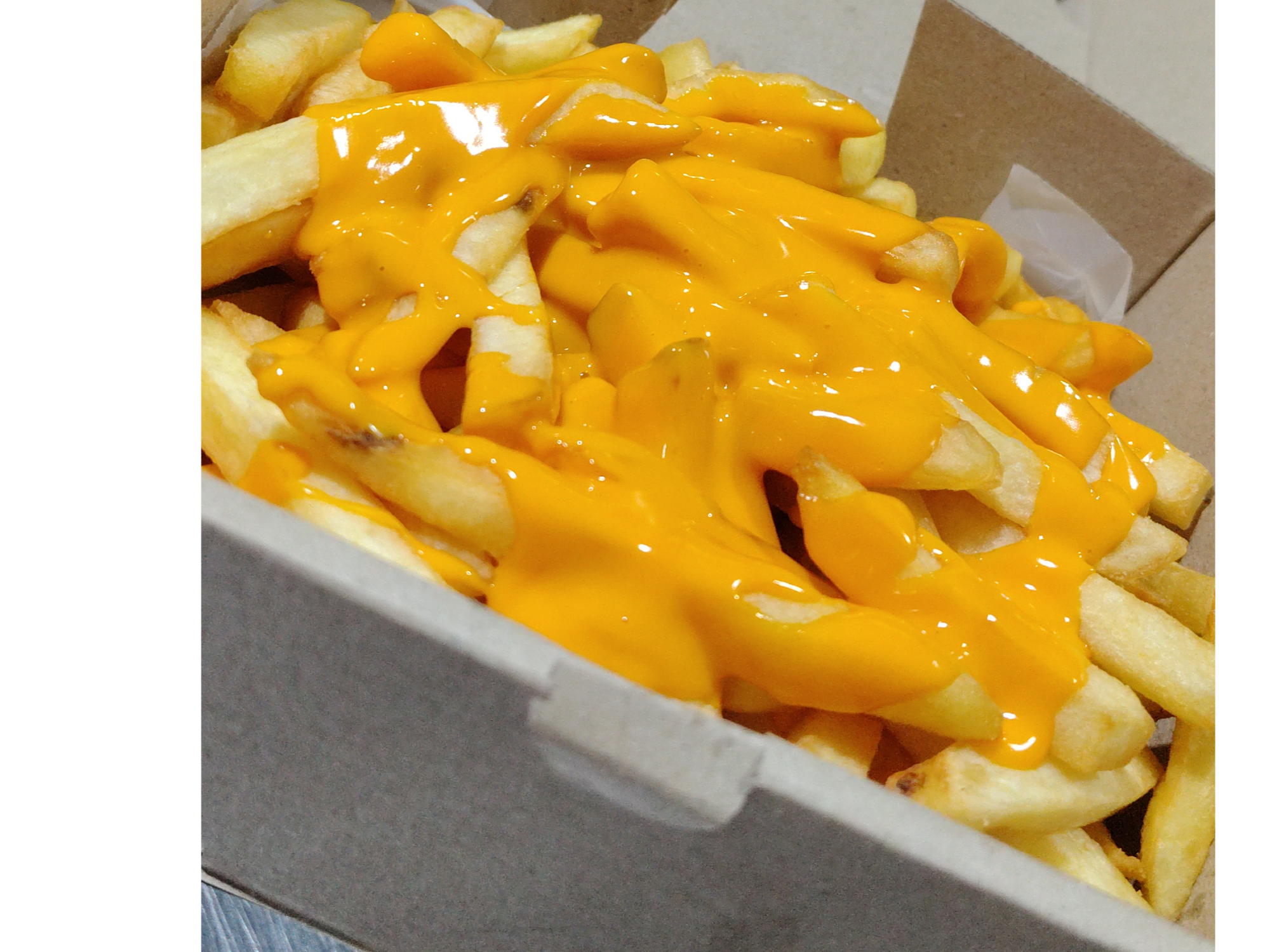 Papas fritas con cheddar