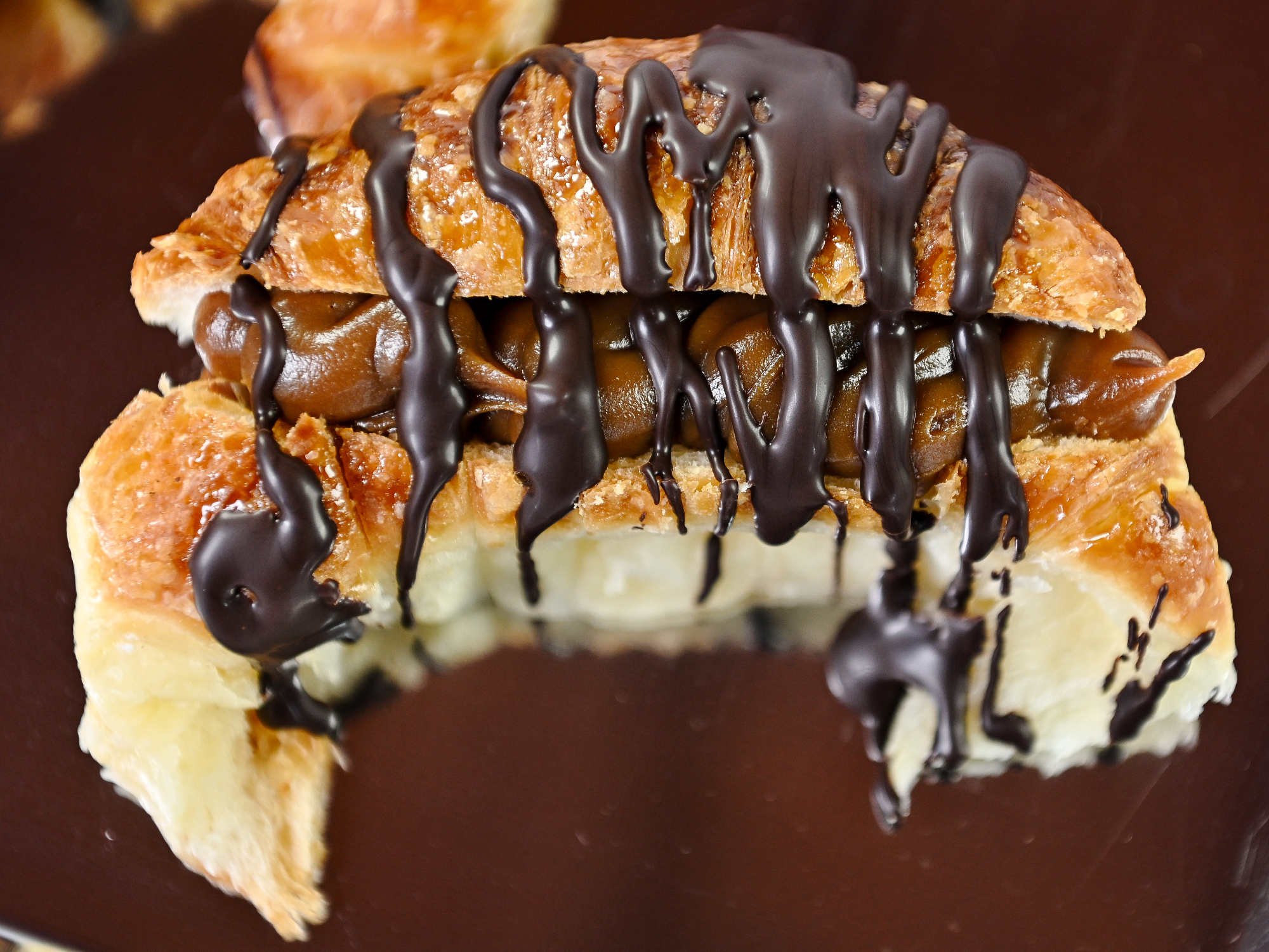 MEDIALUNA CON CHOCOLATE Y DULCE DE LECHE UNIDAD