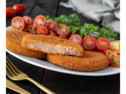 Medallón de merluza con tomate y queso
