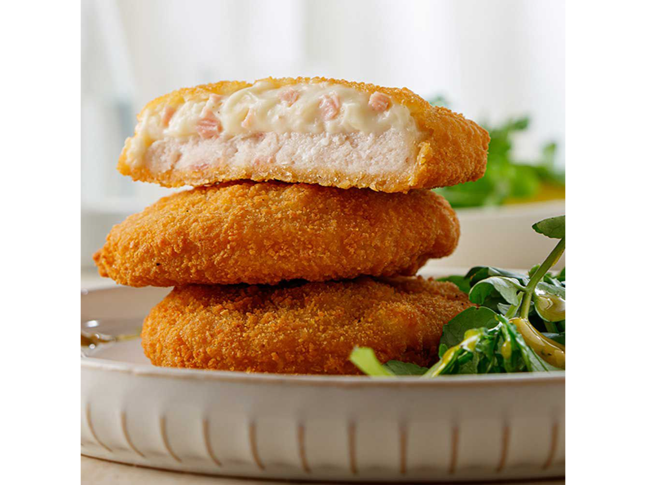 Medallón de merluza con jamón y queso