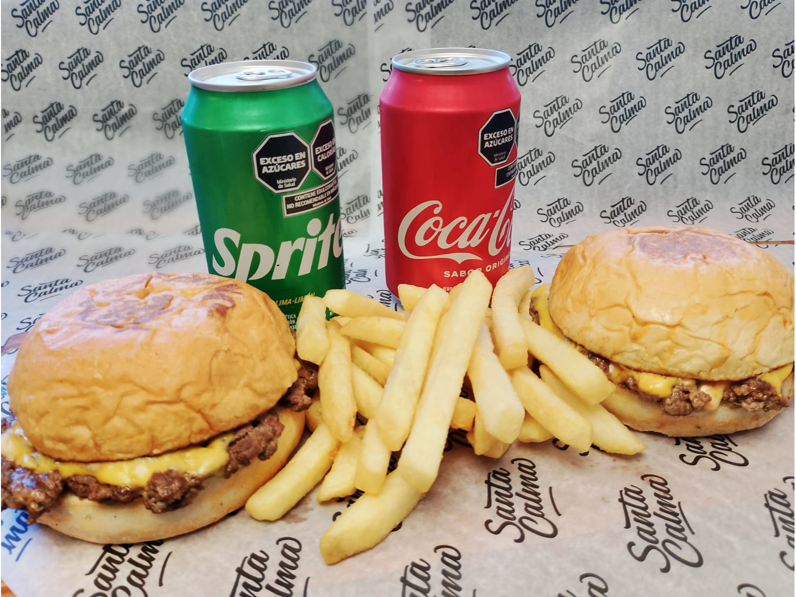 2 Hamburguesas chesseburger + 2 gaseosas en lata 357ml